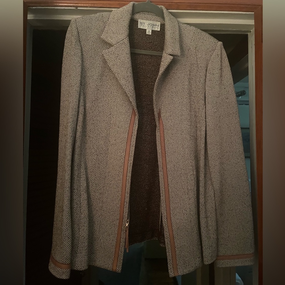 St John Collection adorned with tan leather trim